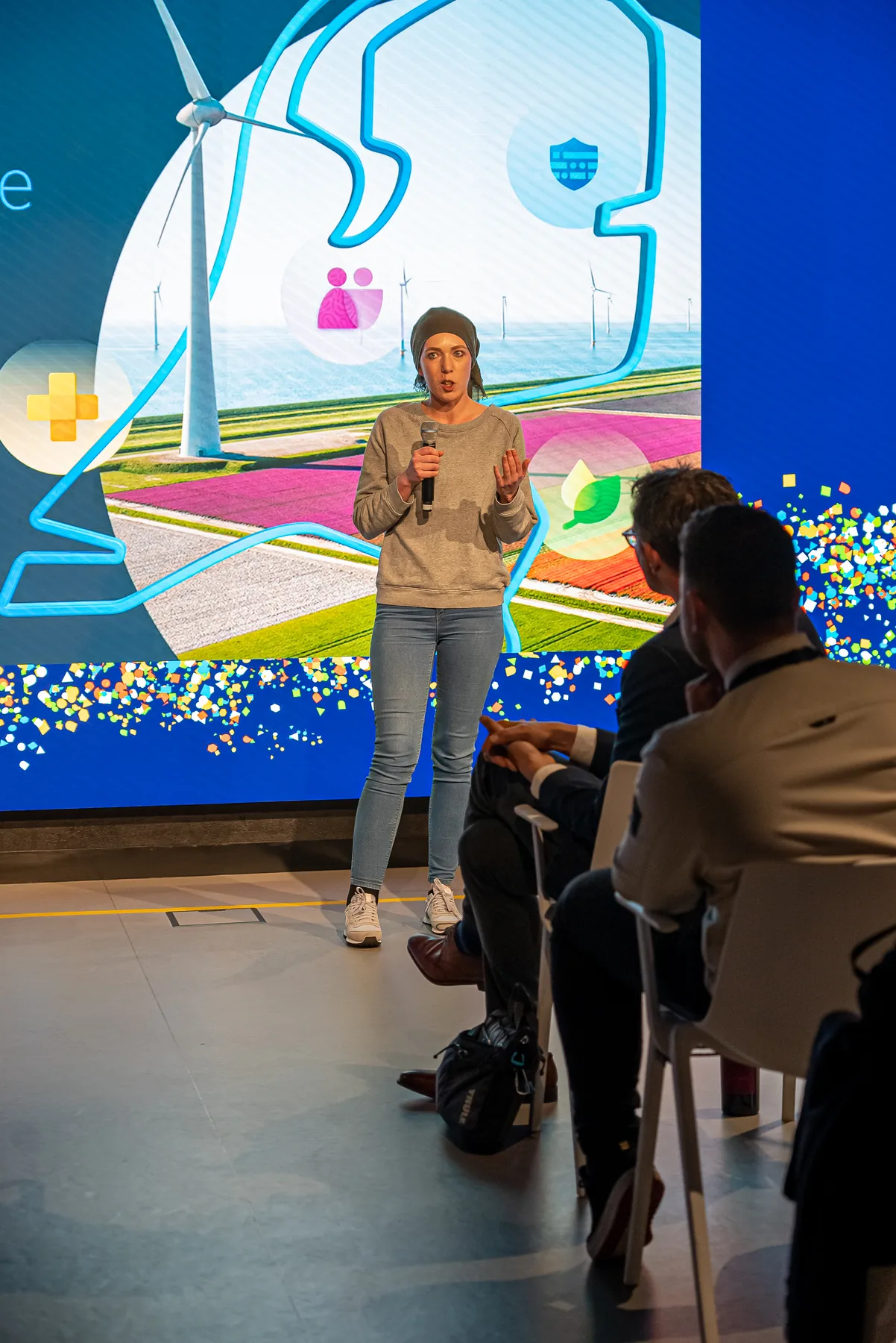 Daphne speaking with a room of Microsoft partners and colleagues.